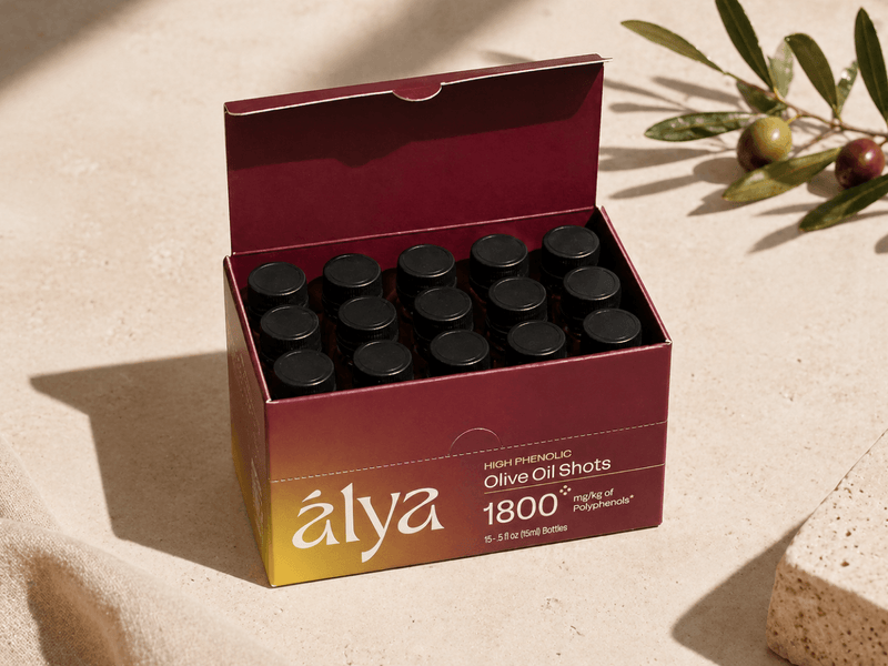 An open Alya box among olive branches